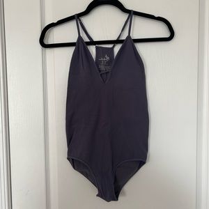 Blue Free People bodysuit in a size m/l for sale